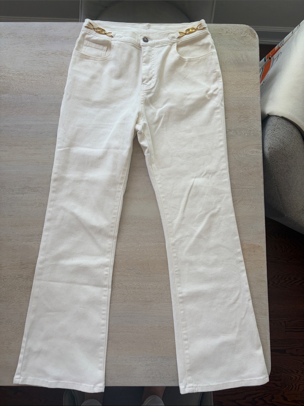 Celine White High-Rise Bootcut Jeans with Gold Chain Accent